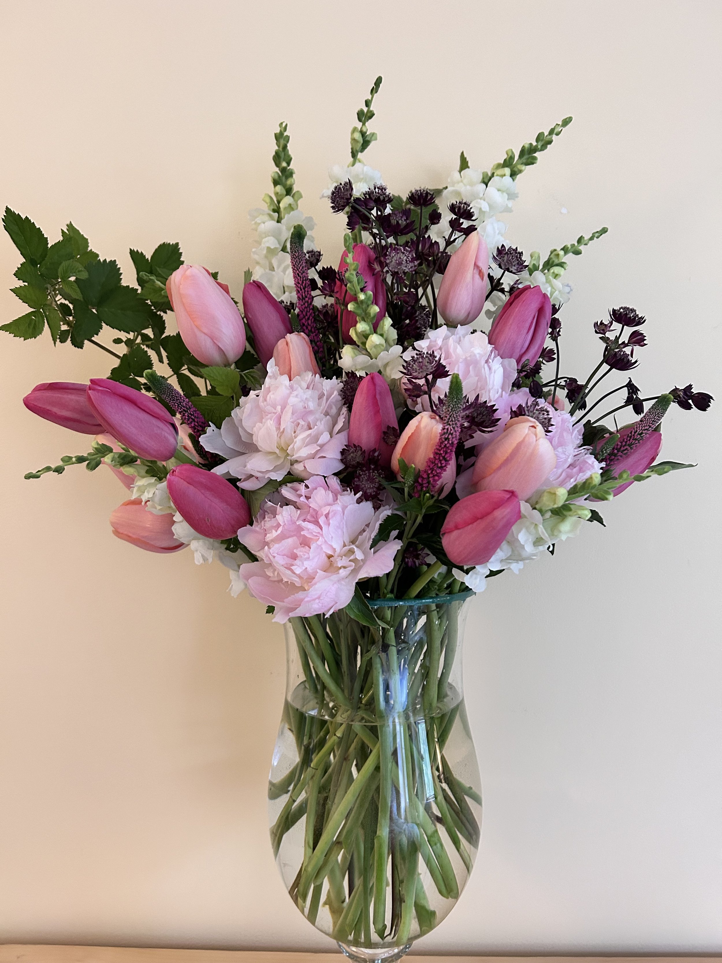 Custom bouquet with seasonal blooms.