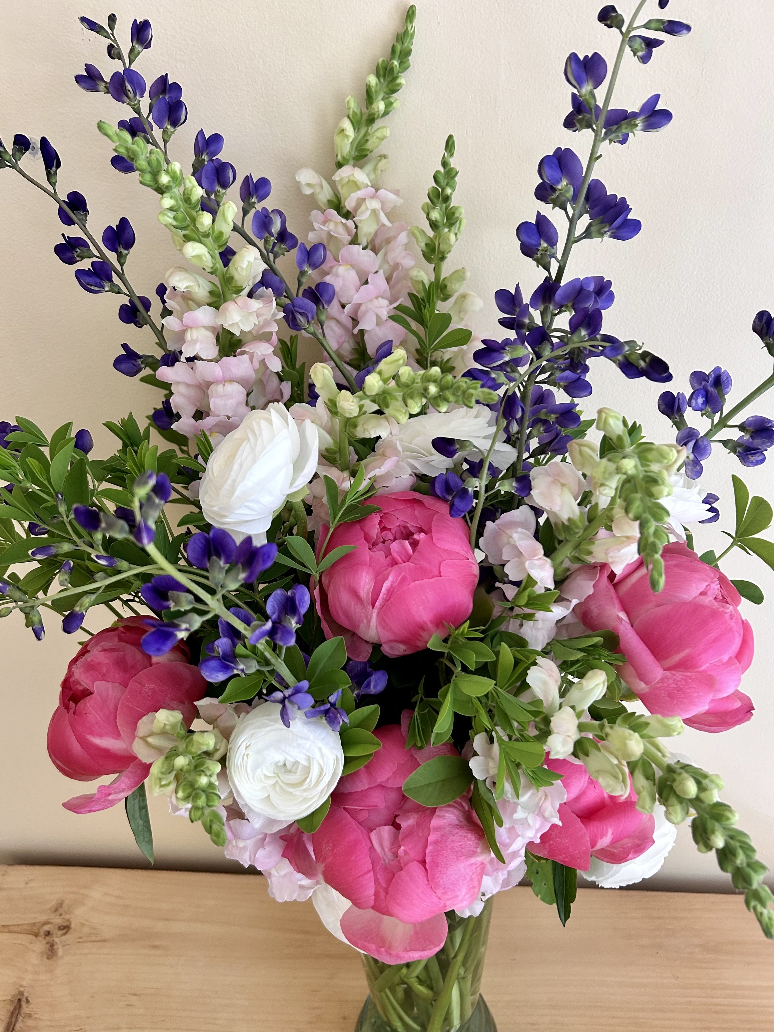 Custom bouquet with seasonal blooms.