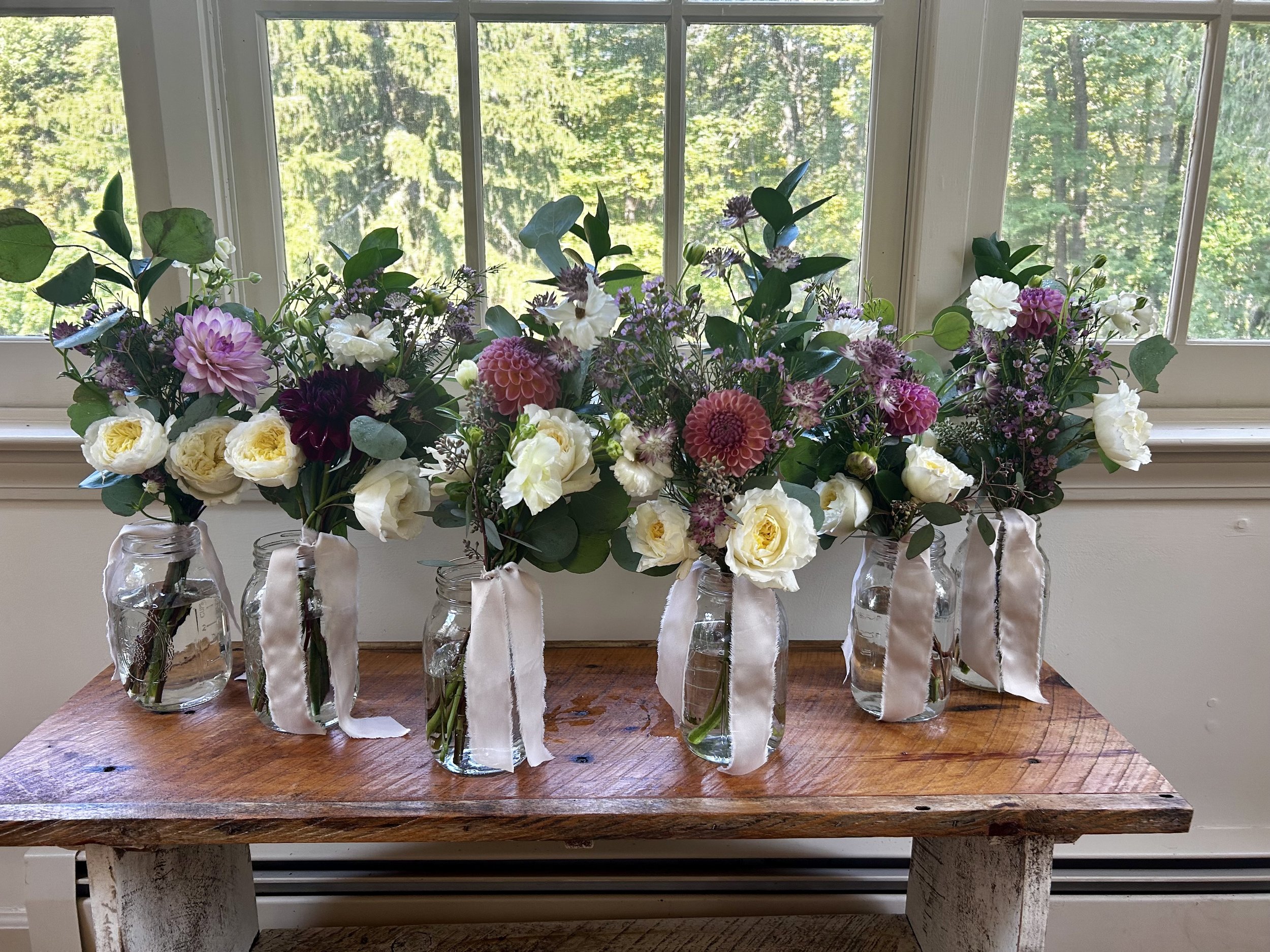 Custom bouquet with seasonal blooms.